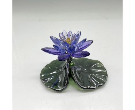 Exquisite combination of Provence Lavender and blue violet petals with Jonquil and light Topaz center, rhodium stem, and spar