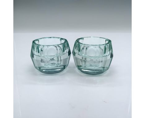 Beautiful candle holders designed by Karim Rashid. They come in their original box which measures 6"L x 3.75"W x 2.75"H. Arti