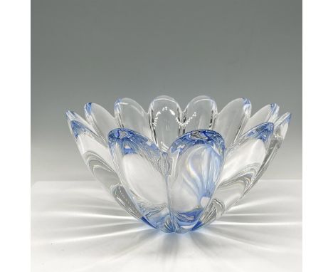 Twelve joined crystal petals creates a lovely flower opening into a bowl. Orrefors etched mark. Artist: Jan JohanssonIssued: 