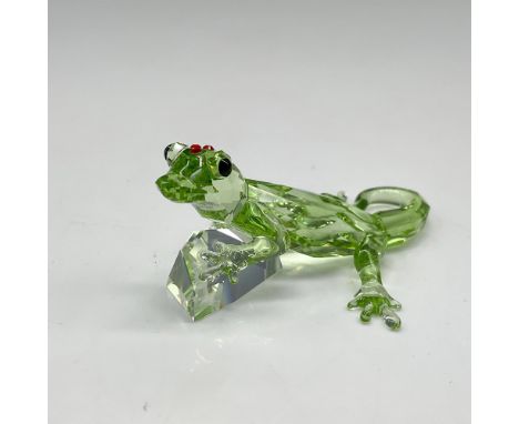 This faceted figural was the 2008 SCS event piece. Created from green crystal with red crystal stones on his head standing on