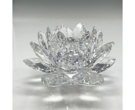 Lovely crystal faceted petals around center holder. Swarovski backstamp. 7600 123 000. This item has its original box: 5"H x 