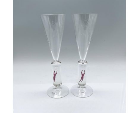 Designed by Bertil Vallien, a set of 2 clear champagne glassware to celebrate the millennium, and to inspire peace and optimi