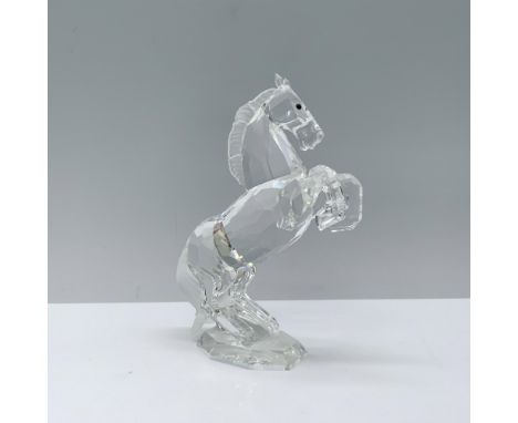 A clear horse poised on its hind legs, featuring captivating black crystal eyes and adorned with a frosted mane and tail. Swa