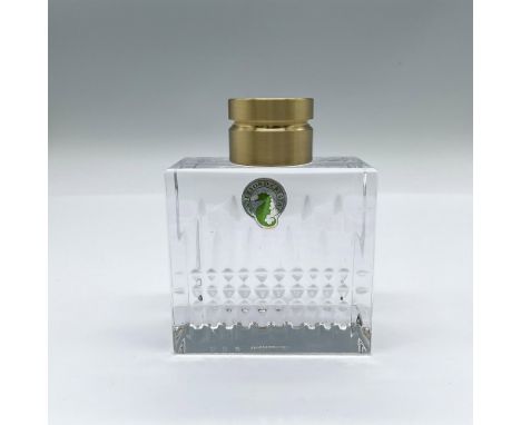 A single candlestick holder with a cross-cross and vertical cuts on the front. Waterford stickered and engraved marking. Issu