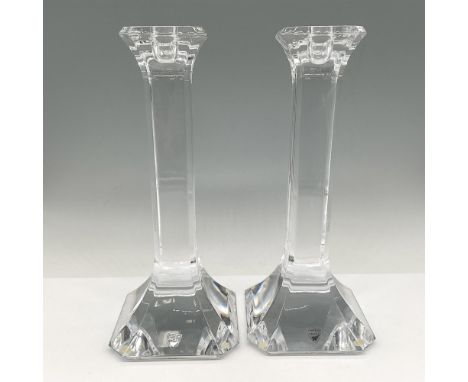 Clear crystal pillars with fluted edge at top and bottom. Orrefors mark. Issued: 21st centuryDimensions: 4.25"L x 4.25"W x 10