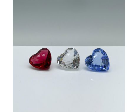A set of three crystal hearts in red (215371), blue (210899), and clear (199130) coloration featuring rectangular cuts and sm