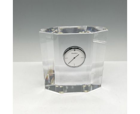 Modernist angles and simple, clean design make this crystal clock a wonderful addition for your home. Orrefors mark. Issued: 