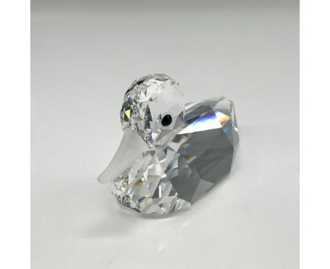 Clear crystal head and body with frosted crystal beak and jet crystal button eyes. Swarovski backstamp. 7647 080 000. This it