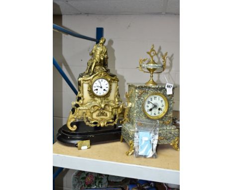 AN EARLY 20TH CENTURY SPECKLED GREY MARBLE AND GILT METAL MANTEL CLOCK, urn surmount, foliate side handles, enamel dial with 