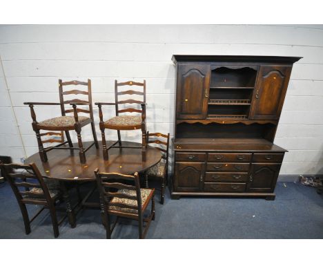 A REPRODUCTION OAK DINING SUITE, comprising an oak oval gate leg table, open length 168cm x closed length 51cm x depth 116cm 