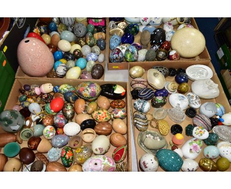FOUR BOXES OF DECORATIVE EGG ORNAMENTS, approximately one hundred and forty eggs to include polished stone, ceramic, wooden, 