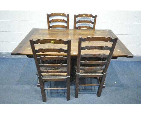 A REPRODUCTION OAK RECTANGULAR DINING TABLE, on turned supports united by a stretcher, length 146cm x depth 89cm x height 75c