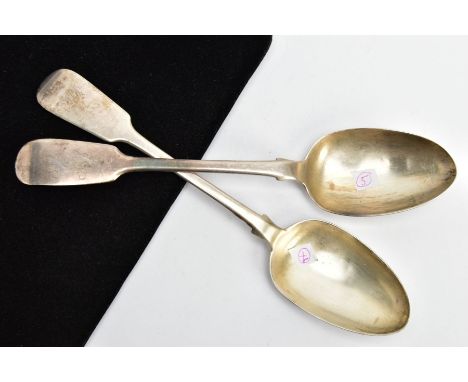 TWO MID-VICTORIAN SERVING SPOONS, fiddle pattern serving spoons, each with worn engravings to the terminals, hallmarked 'John