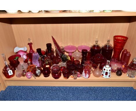 A COLLECTION OF 19TH AND 20TH CENTURY COLOURED GLASSWARE, MOSTLY CRANBERRY AND RUBY, includes a cased glass table bell painte