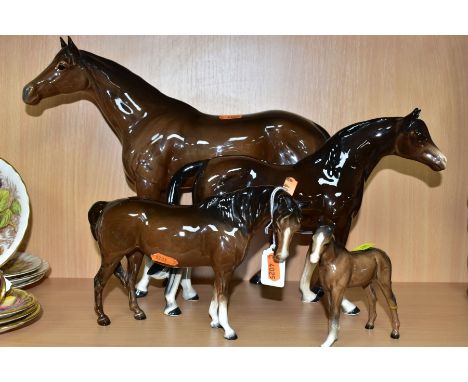 TWO BESWICK BROWN GLOSS HORSES AND A FOAL, TOGETHER WITH ANOTHER UNMARKED BROWN GLOSS HORSE, the Beswick comprising Large Rac