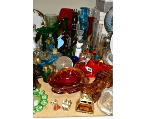 A GROUP OF COLOURED GLASSWARES, to include a Dartington Crystal aqua daisy bottle vase, bud vases, art glass bowls, lampwork 