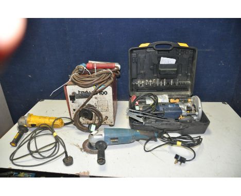 A PERFORMANCE PRO 1/2in ROUTER in case with bits, a Workzone angle grinder, a Trojan vintage arc welder (all PAT pass and wor
