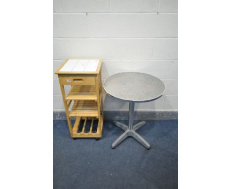 AN ALUMINIUM BISTRO CIRCULAR PATIO TABLE, diameter 60cm x height 71cm, and a tile top kitchen trolley (2)