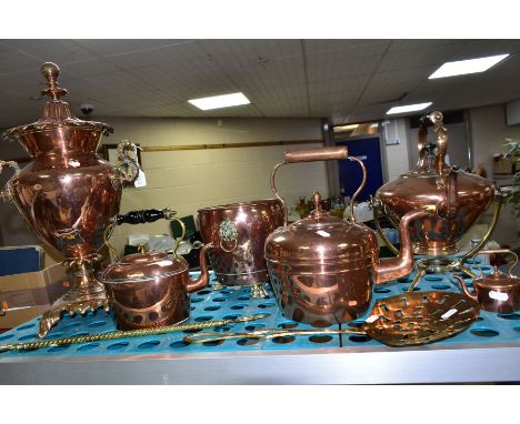 EIGHT PIECES OF 19TH AND 20TH CENTURY COPPER AND BRASSWARE, comprising a brass toasting fork, a brass cream skimmer, a copper