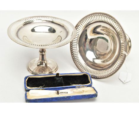 TWO SILVER CANDLE STICKS AND A BOXED BUTTER KNIFE, each candle stick has a knopped stem leading onto a circular pierced rim b