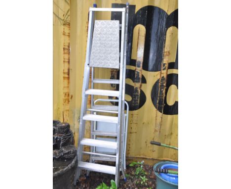 THREE STEP LADDERS, two of which are aluminium of similar heights 186cm and a small set of steel steps (3)