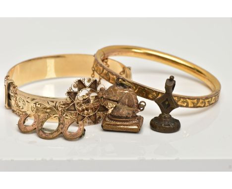 TWO GOLD PLATED HINGED BANGLES, TWO FOB SEALS AND A PENDANT, to include a floral engraved hinged bangle fitted with a push bu