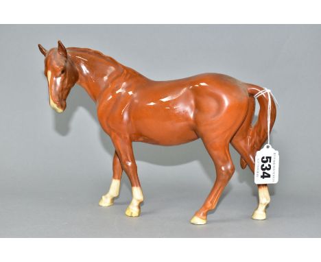 A BESWICK MARE FACING LEFT IN CHESTNUT GLOSS, model no.976 (Condition report: both ears have been damaged and repaired, two h