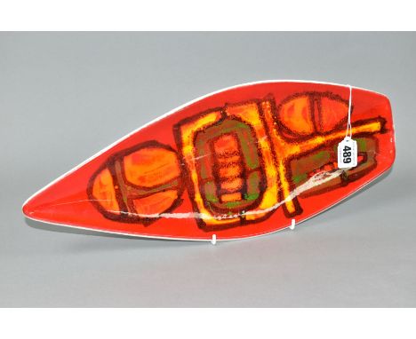 A POOLE POTTERY DELPHIS SPEAR SHAPED PLATTER, orange, red and green glazes, printed factory marks and painted CC, length 43cm