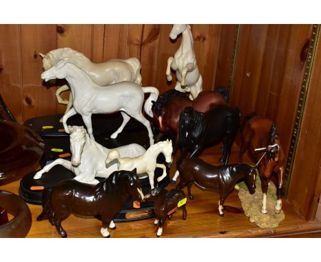 ELEVEN BESWICK AND ROYAL DOULTON HORSE FIGURES, comprising Royal Doulton The Winner DA154B/2 on naturalistic base, Spirit of 