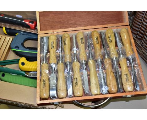 A BOX OF GARDENING AND WOODWORKING TOOLS, including a cased set of Powerfix Profi+ wood carving chisels, a soft Stanley tool 