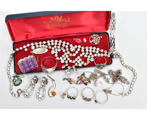 A BAG OF JEWELLERY, to include a silver Celtic designed hinged bangle, fitted with a latch clasp and two figure of eight safe