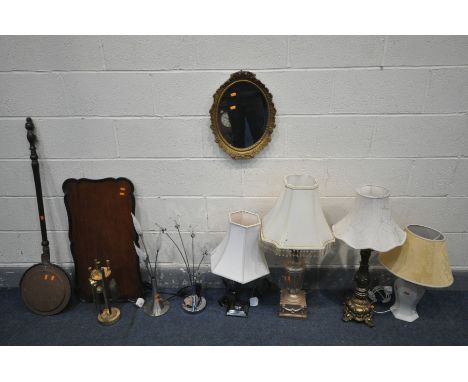 A SELECTION OF TABLE LAMPS, to include a French metal table lamp, a chrome column lamp, and four other lamps, along with a br