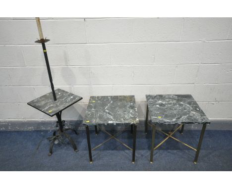 A WROUGHT IRON STANDARD LAMP, with a marbleized central shelf, height 139cm, and a pair of brass and marbleized square lamp t