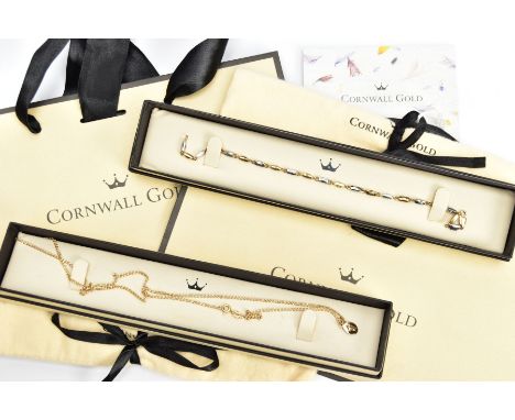 A 9CT GOLD NECKLACE AND BRACELET, a curb link yellow gold chain fitted with a small oval pendant detailing a cross, approxima