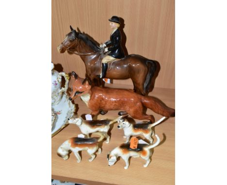 A BESWICK HUNTSWOMAN, HOUNDS AND FOX FIGURES, comprising Huntswoman on Brown Horse 1730 height 21cm, four first and second ve