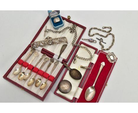 A SELECTION OF SILVER ITEMS, to include a cased set of six silver coffee spoons each set with a three pence coin to the termi