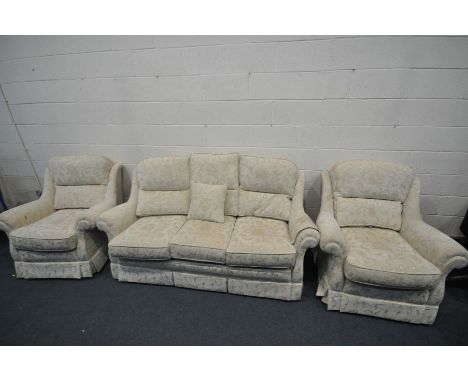 A CREAM AND FLORAL UPHOLSTERED THREE PIECE LOUNGE SUITE, comprising a three seater sofa, length 194cm x depth 98cm x height 8