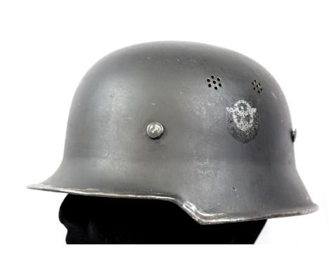 WWII type German lightweight Police helmet. P&amp;P Group 2 (£18+VAT for the first lot and £2+VAT for subsequent lots) 