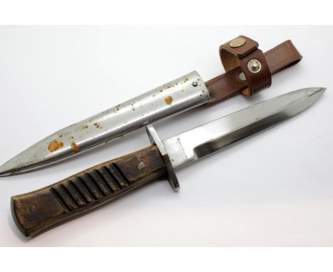 20th century German fighting knife and steel scabbard, blade L: 15 cm, total L: 29 cm. P&amp;P Group 1 (£14+VAT for the first