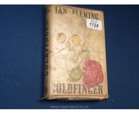 A first edition of 'Goldfinger' by Ian Fleming, Library edition, dust cover worn, loose binding.