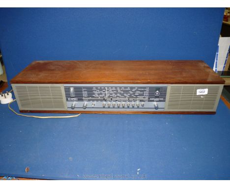 A table top Beomaster 900, stereo Automatik radio and music speaker.