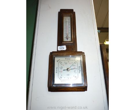 A wooden Barometer with thermometer, 17 1/2" long.