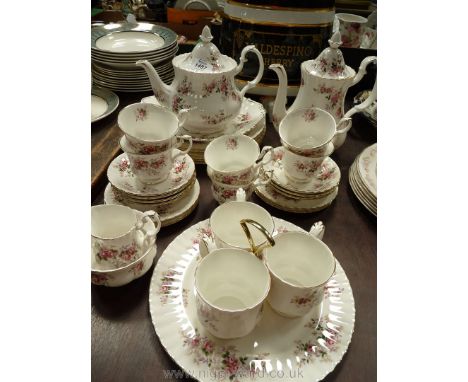 A quantity of Royal Albert 'Lavender Rose' dinner/tea/coffee ware including; tea pot, cups &amp; saucers, cake plate, etc.