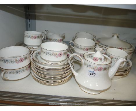 A part Dinner and Teaset, Paragon 'Belinda', including a lidded tureen, meat plate, teapot, two cups, six saucers, etc., (one