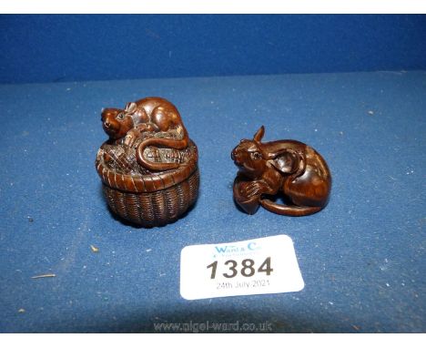 Two contemporary oriental wooden Netsuke mice.