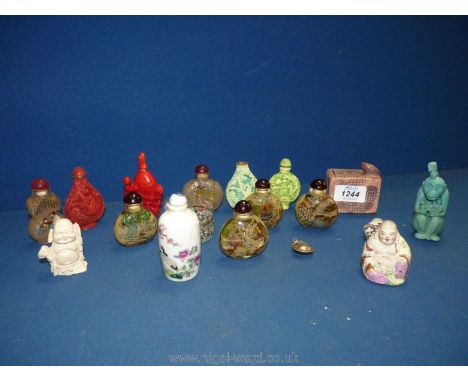 A quantity of oriental snuff/perfume bottles including glass, ceramic, carved cinnabar, pale turquoise etc.