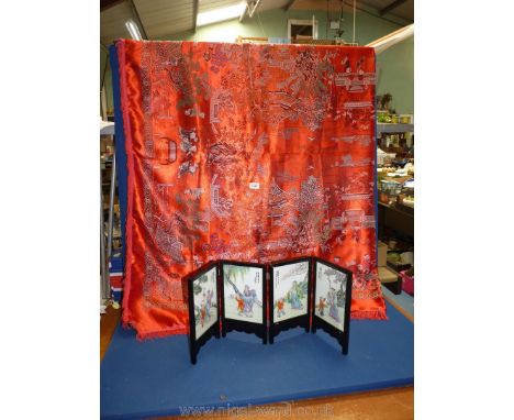 A vivid red oriental table cover with fringing, 71'' long x 55'' wide. and a miniature modern four panel screen with ceramic 