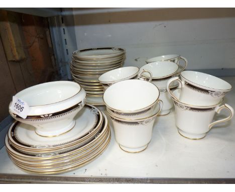 An Aynsley part Teaset in 'South Pacific' pattern including ten cups, nine small saucers, six large saucers, bread and butter
