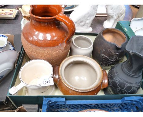 A quantity of pottery including large stoneware pitcher, old clay jug, tankards, vase etc.