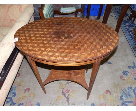 An oval parquetry topped occasional Table standing on lightwood strung tapering square legs united by a lower shelf, 29 3/4''